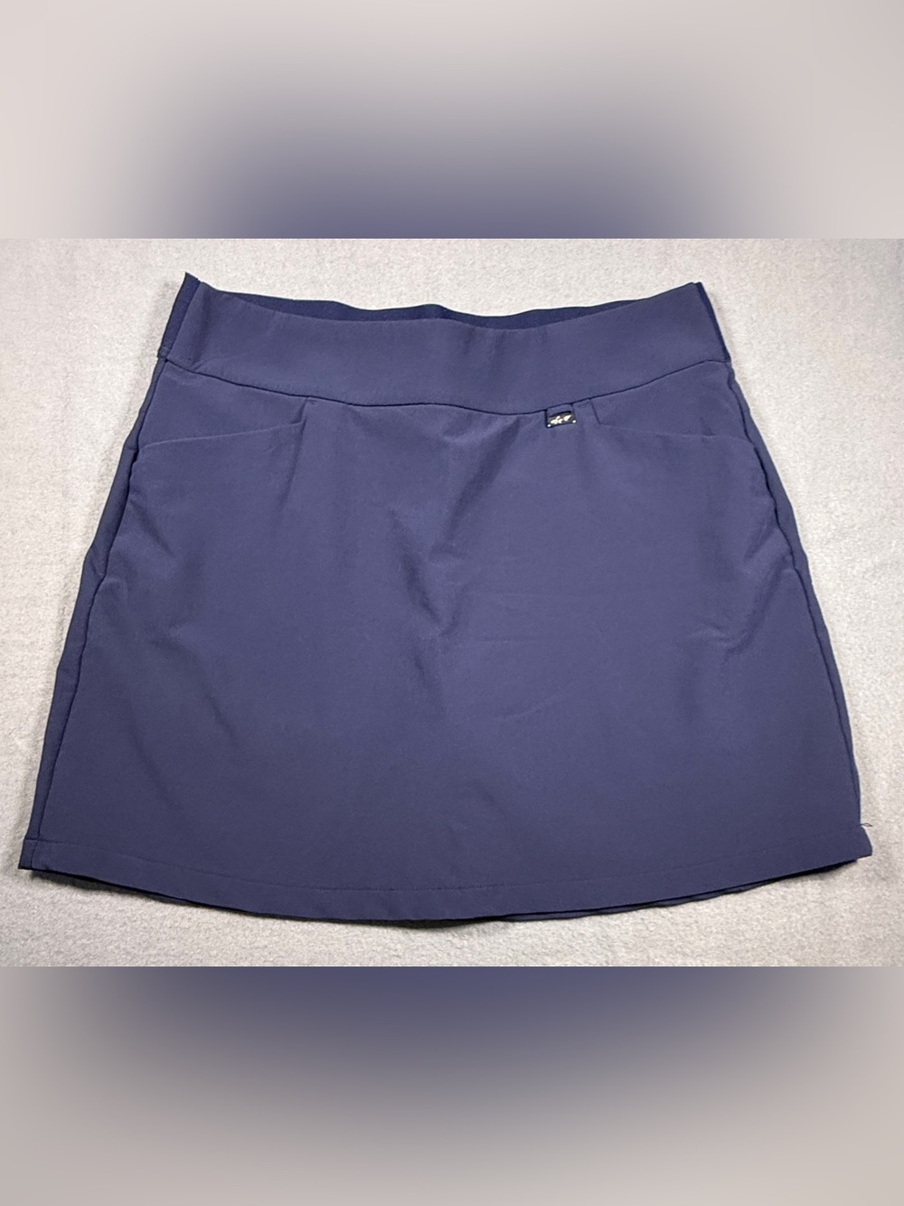 Greg Norman Collection Navy Performance Midi Skort